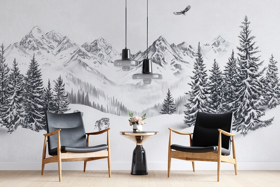 Verschneite Berglandschaft mit Bäumen und einem Vogel, der über sie fliegt