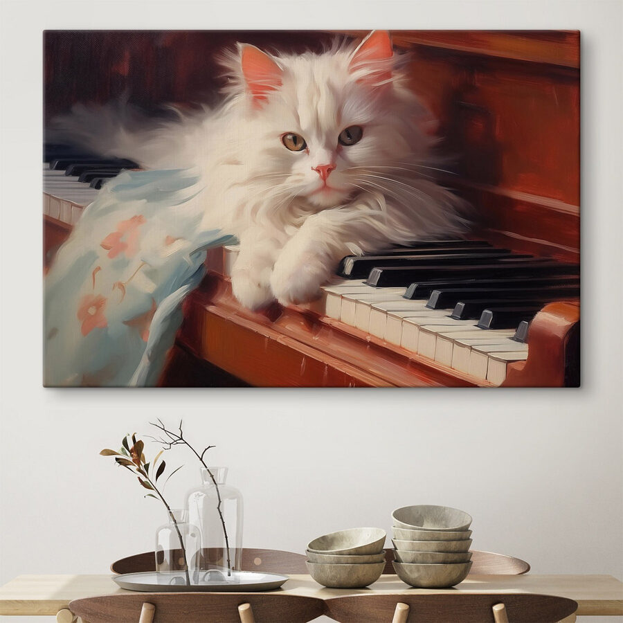 Katze auf einem Klavier liegend