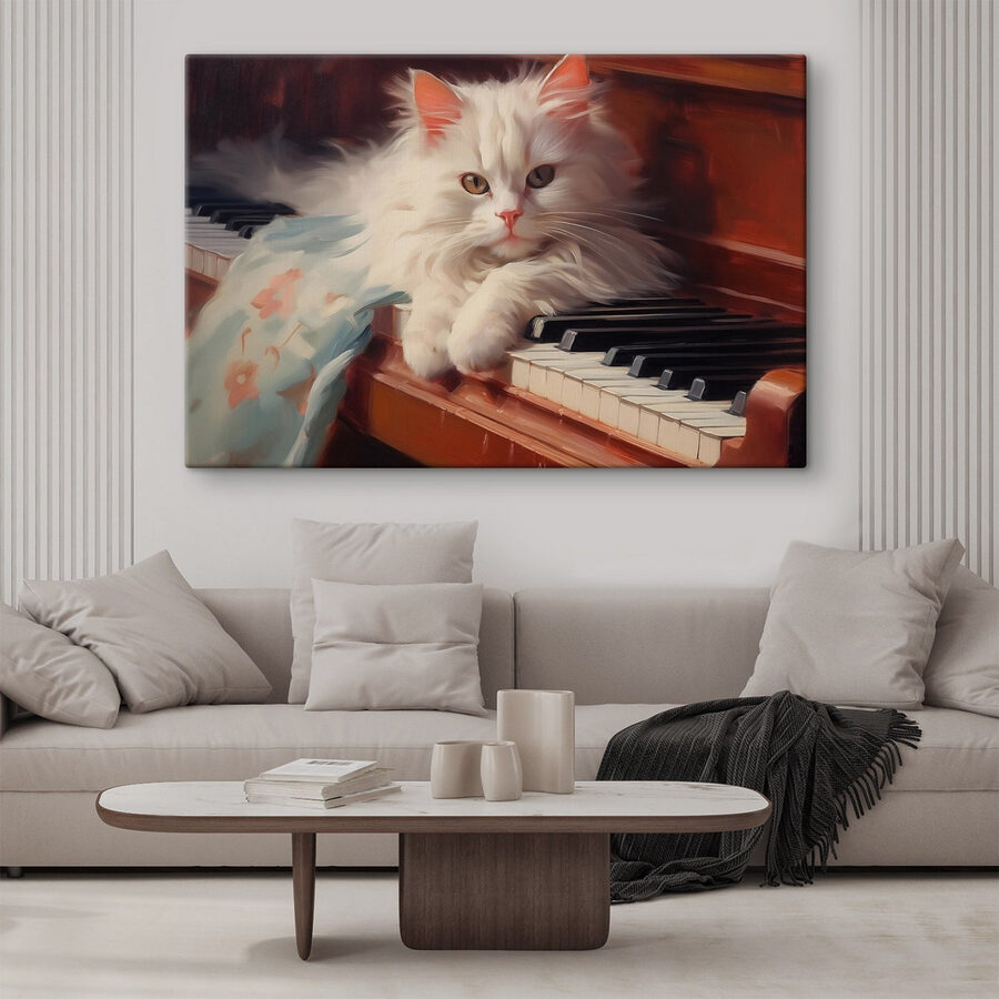 Katze auf einem Klavier liegend