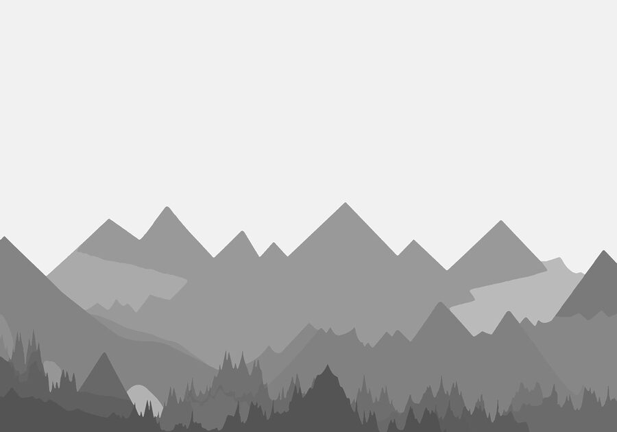 Graue Berge mit Bäumen