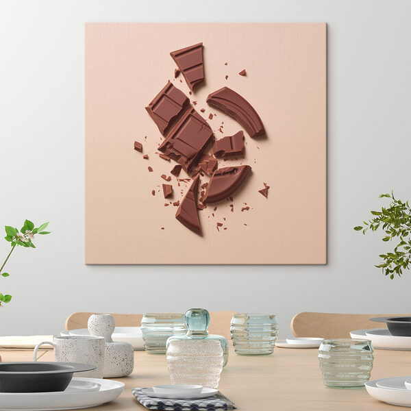 Zerbrochene Schokoladentafel auf einer rosa Fläche Zerbrochene Schokoladentafel auf einer rosa Fläche