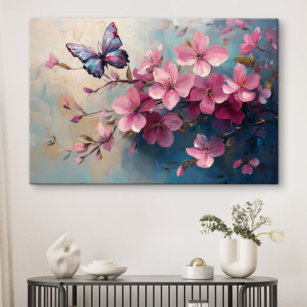 Butterfly on a branch of pink flowers