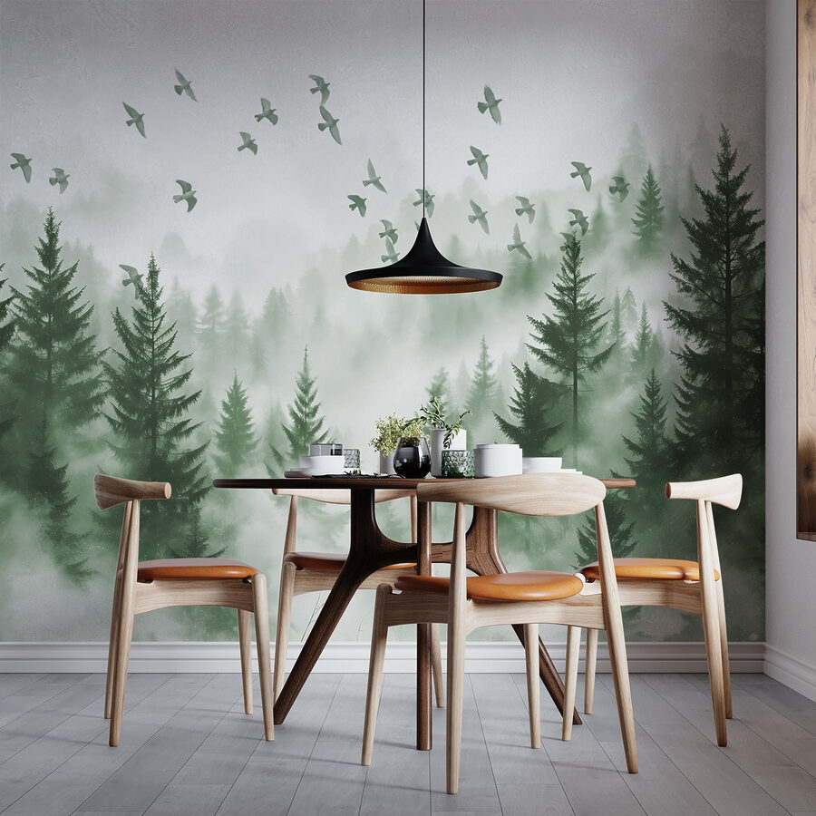 Vögel fliegen über einen Wald