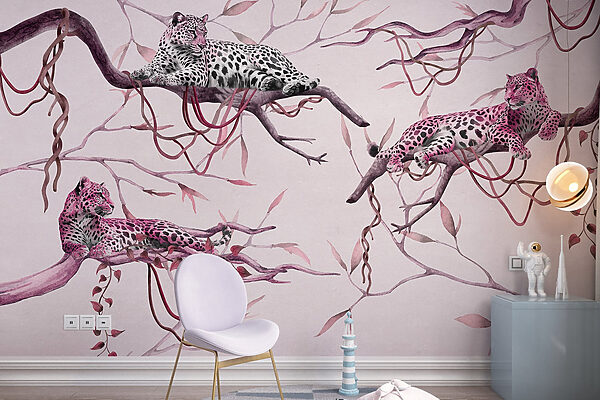 Group of leopards lying on a tree branch