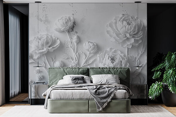 Weiße Blumenschnitzerei an einer Wand Weiße Blumenschnitzerei an einer Wand