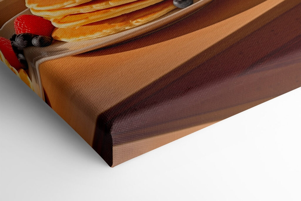 Stack of pancakes with berries and a glass of juice on a table