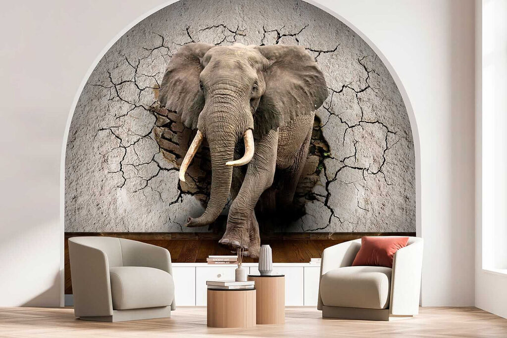 An elephant coming through a wall