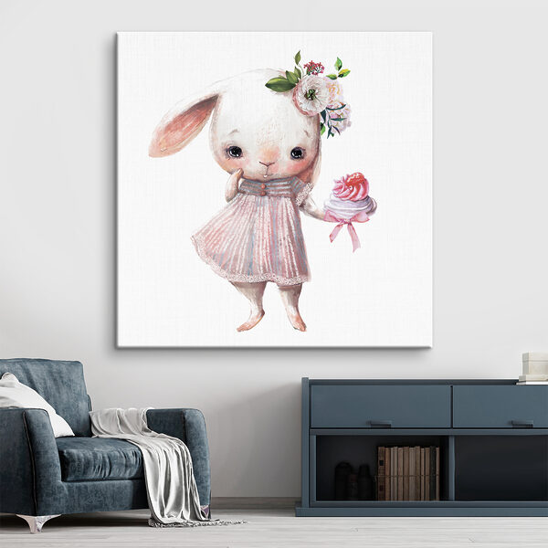 A cartoon of a bunny holding a cupcake A cartoon of a bunny holding a cupcake
