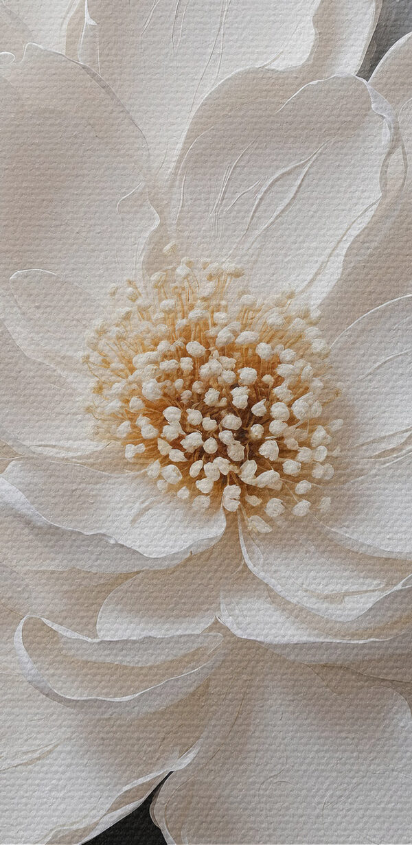 A white flower with black and grey leaves