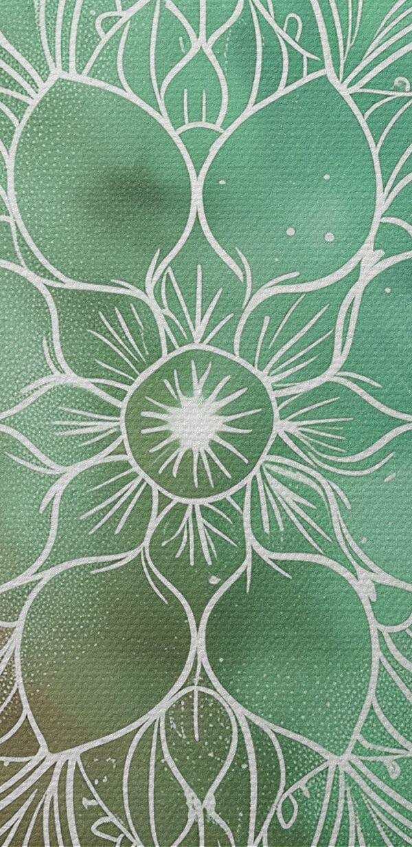 Ein weißes Mandala auf grünem und blauem Hintergrund Ein weißes Mandala auf grünem und blauem Hintergrund