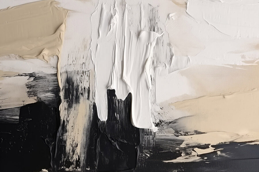 Weiße und schwarze Farbe auf einer weißen Fläche