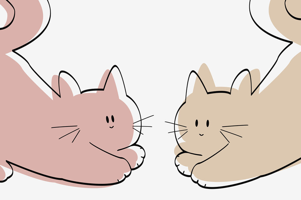 Ein paar liegende Katzen Ein paar liegende Katzen