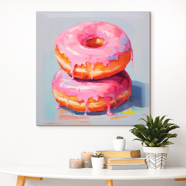 Zwei Donuts mit rosa Zuckerguss Zwei Donuts mit rosa Zuckerguss