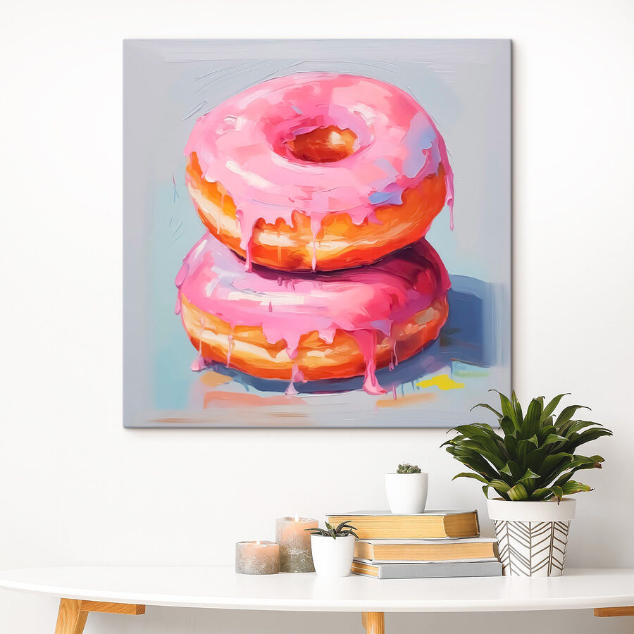 Zwei Donuts mit rosa Zuckerguss Zwei Donuts mit rosa Zuckerguss