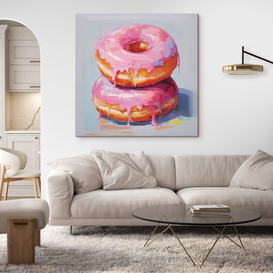 Zwei Donuts mit rosa Zuckerguss Zwei Donuts mit rosa Zuckerguss