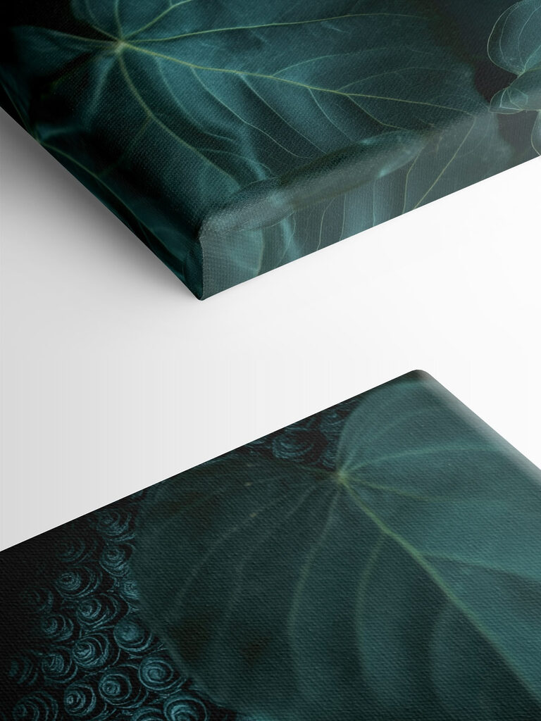 Statue of a person's face surrounded by leaves