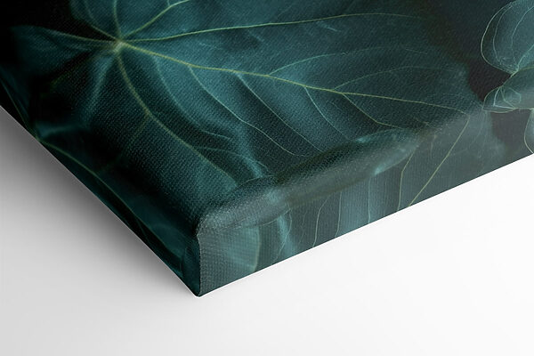 Statue of a person's face surrounded by leaves