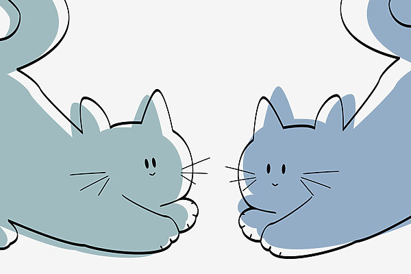 Ein paar liegende Katzen Ein paar liegende Katzen