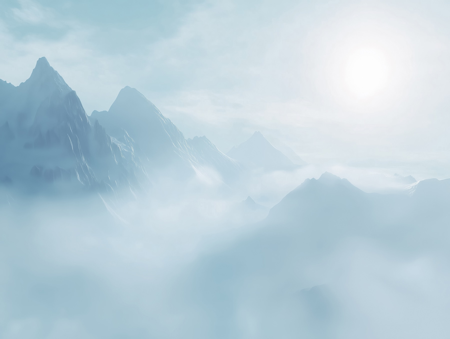 Mountain range with clouds and the sun