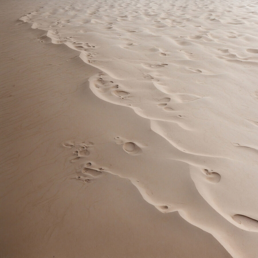 Fußabdrücke im Sand