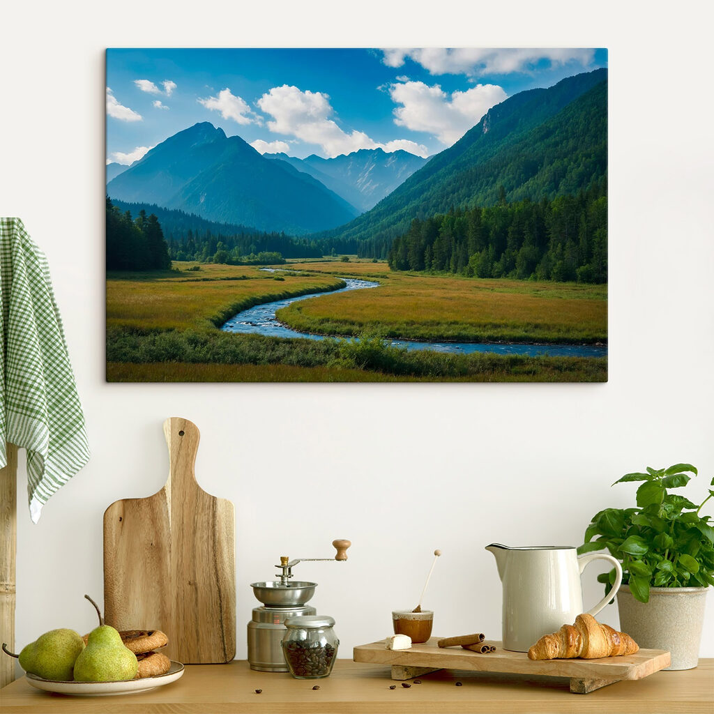 River running through a valley with mountains in the background