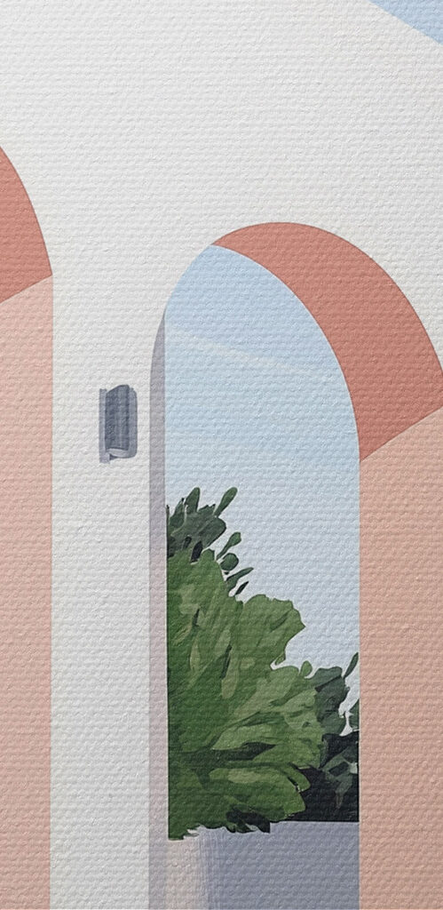 White building with pink arches and trees