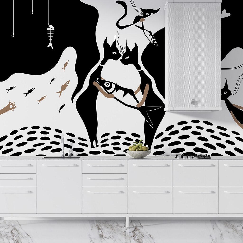 Schwarz-weiße Katze mit Fisch und Fisch