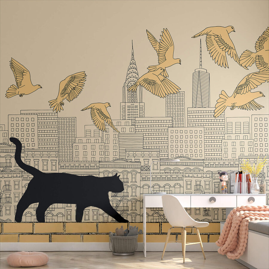 Katze, die auf einer Mauer läuft, während am Himmel Vögel fliegen
