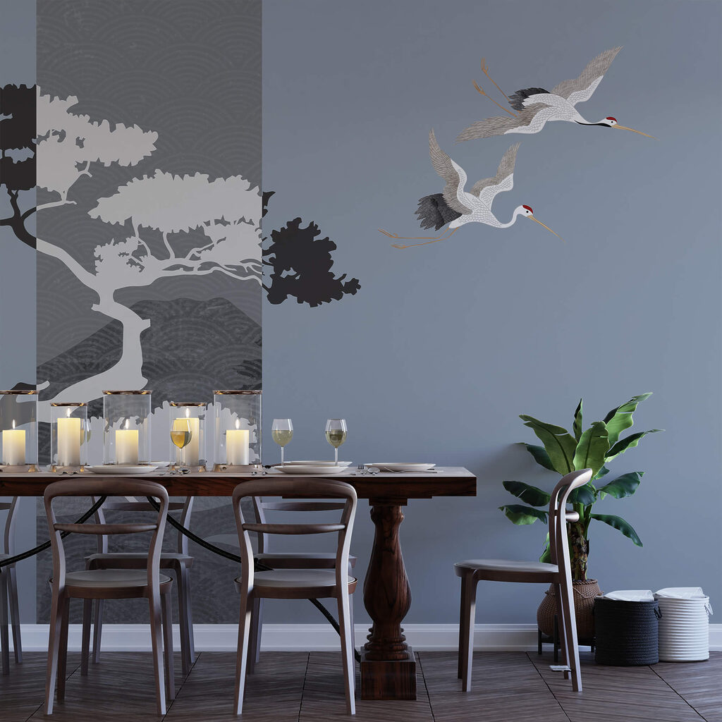 Ein paar Kraniche fliegen neben einem Baum Ein paar Kraniche fliegen neben einem Baum