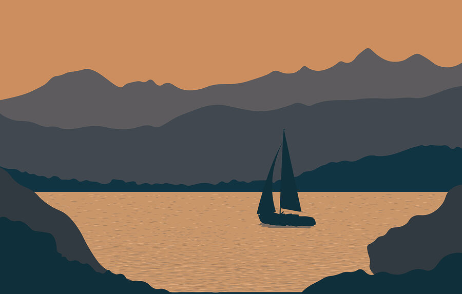 Segelboot auf dem Wasser mit Bergen im Hintergrund