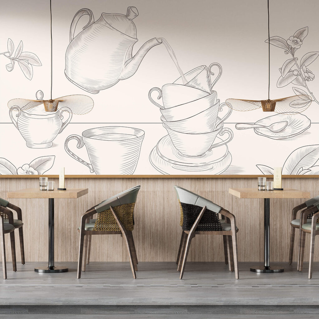 Teekanne, die in einen Stapel Teetassen gießt