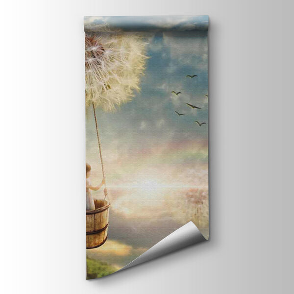 Girl in a basket on a swing with a dandelion in the sky