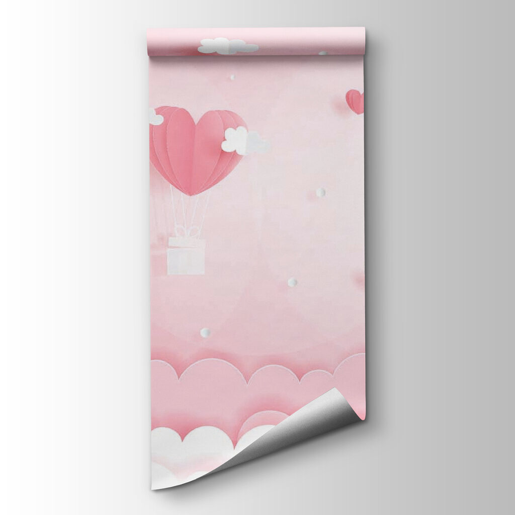 Pink paper cutout of hot air balloons and clouds