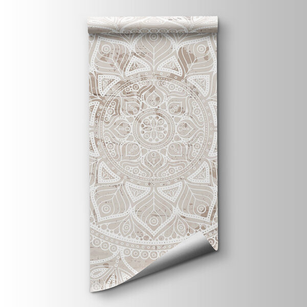 White mandala on a brown surface