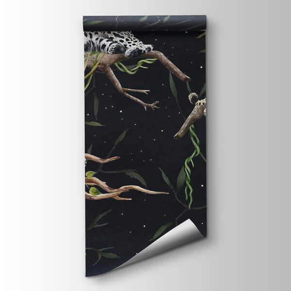 Group of leopards lying on branches