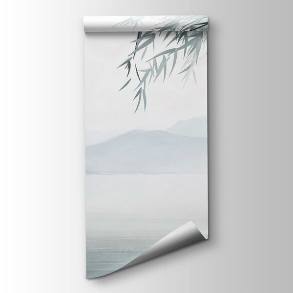 Water and trees with mountains in the background