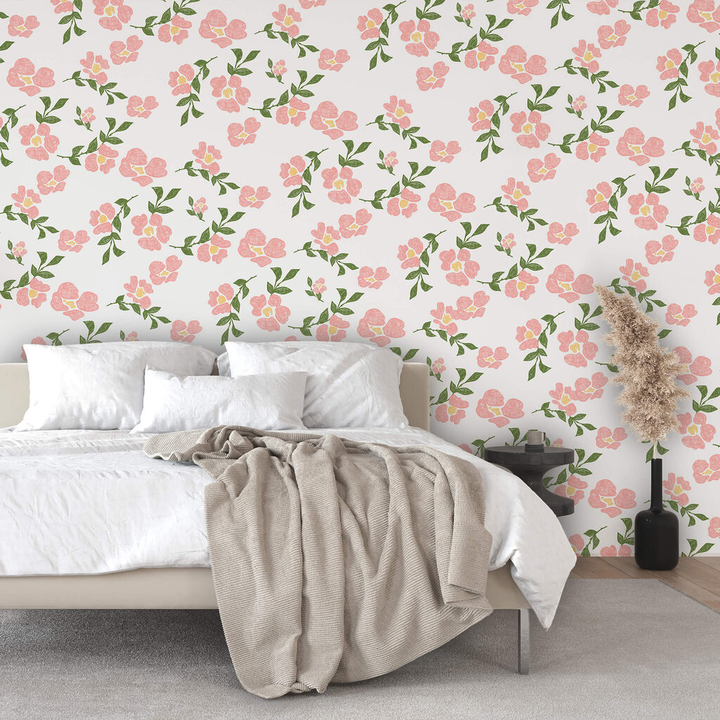 Muster aus rosa Blüten und grünen Blättern