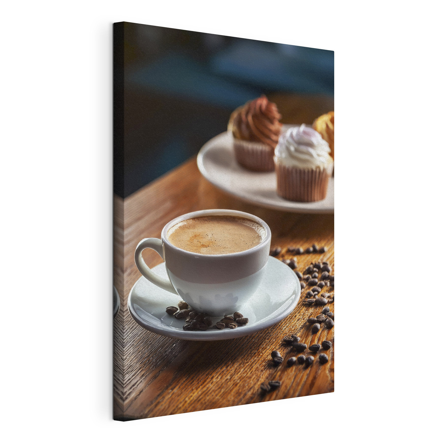 Cup of coffee and cupcakes on a table