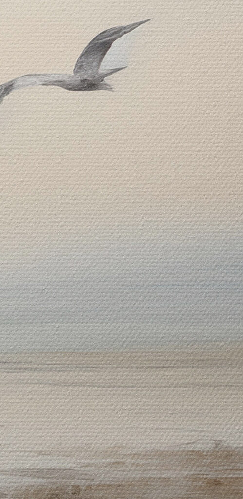 Birds flying over a body of water