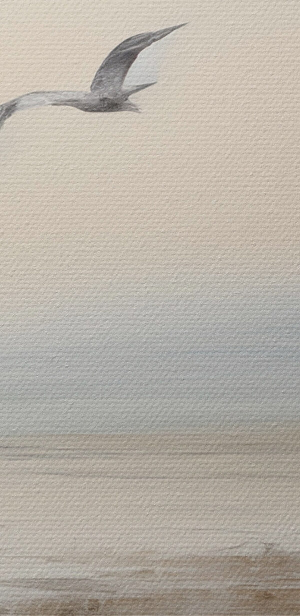 Birds flying over a body of water