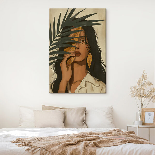 Woman holding a leaf over her face