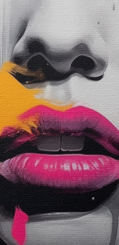 Woman with pink and yellow paint on her face Woman with pink and yellow paint on her face