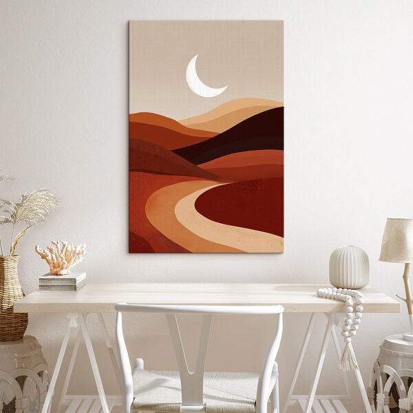 Moon over a desert landscape
