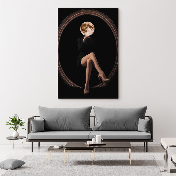 Woman sitting in a chair with a moon in her face Woman sitting in a chair with a moon in her face