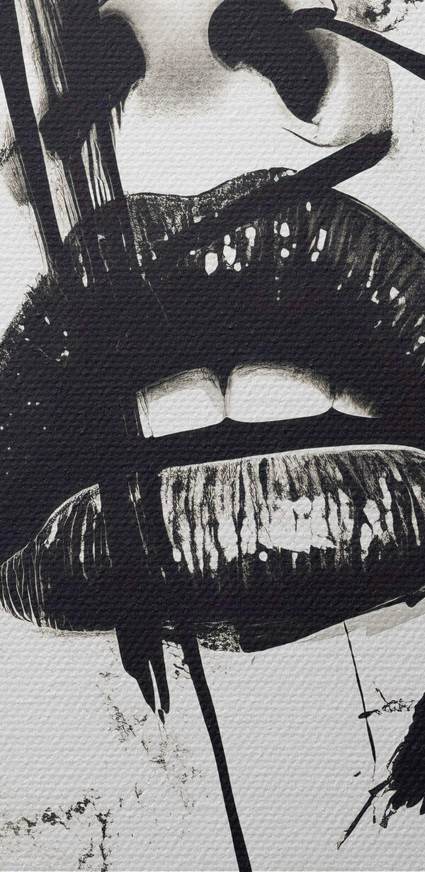 Woman's face with black paint