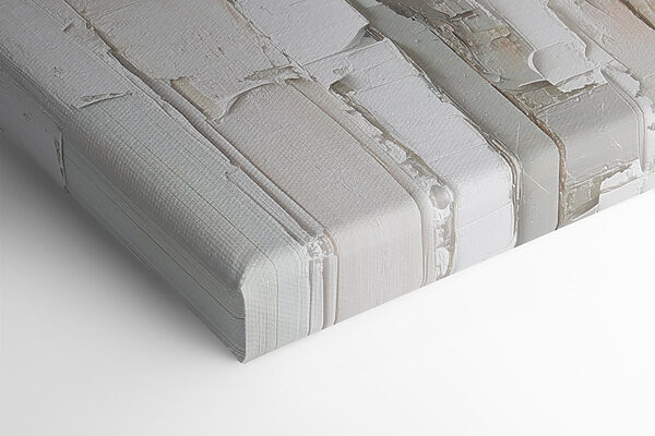 White painted wood with torn pieces of paper White painted wood with torn pieces of paper