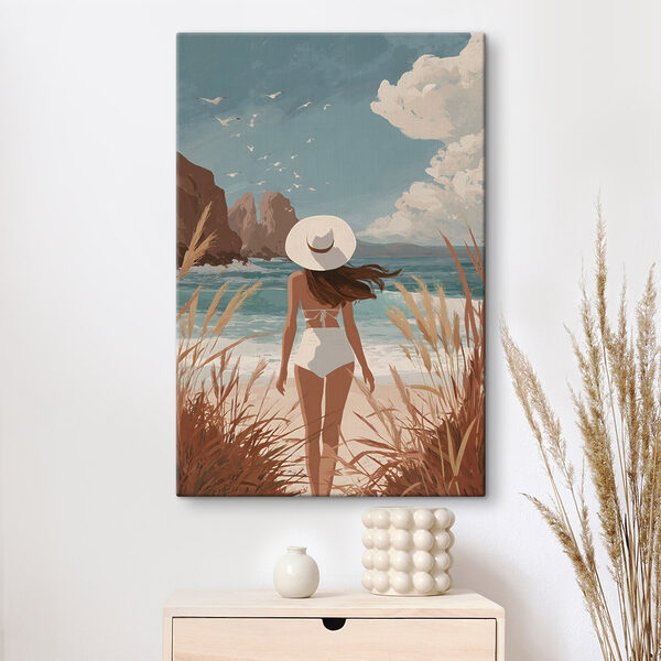 Woman in a swimsuit and hat walking on a beach