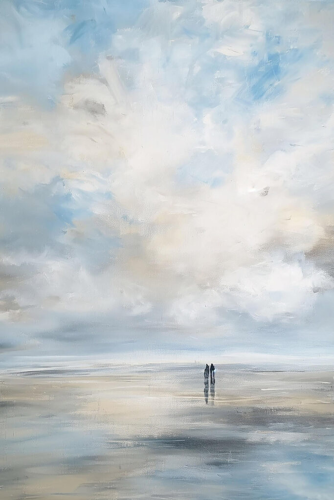 Couple of people standing on a beach