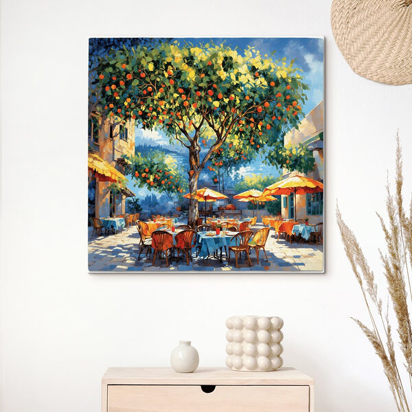 Painting of an orange tree with tables and chairs under an orange tree