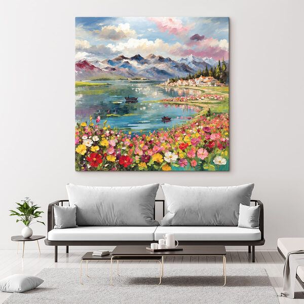 Painting of a lake with flowers and mountains in the background